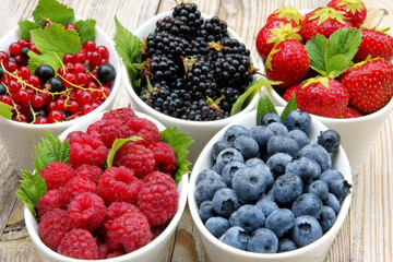 fresh healthy berries in bowls