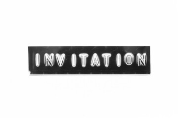 Embossed letter with word invitation in black banner on white paper background