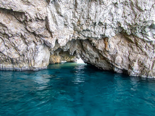 Sea grotto in a white limestone rock