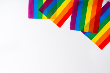 LGBTQ flag and symbol on table top view