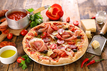 pizza with ham,  mozzarella and chorizo