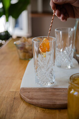 cocktail making in an empty glass at home