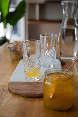 table with empty cocktail glasses at home