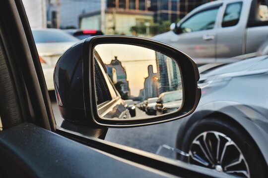 Reflection Of Car On Side-view Mirror