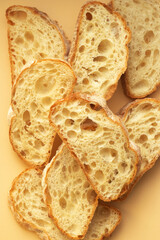 a slice of italian ciabatta bread with yeast holes close up