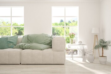 White living room with sofa and summer landscape in window. Scandinavian interior design. 3D illustration