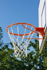 Deurstickers Basketball board with basket hoop on playground. Sport, recreation and healthy lifestyles on fresh air © ratmaner