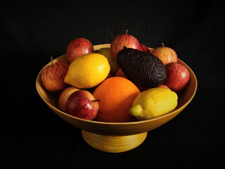 Still life photograph of a bowl of fruit.