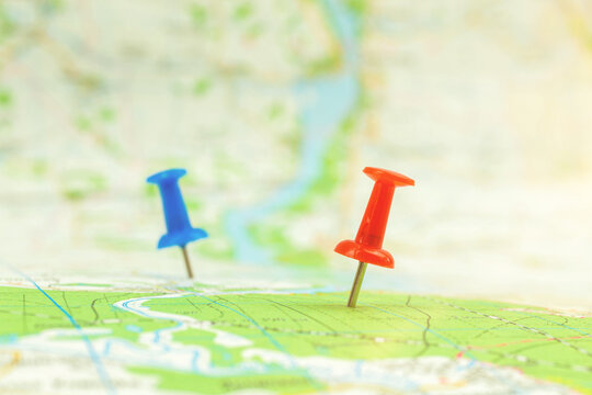 Travel map with navigation markers on it, selective focus photo