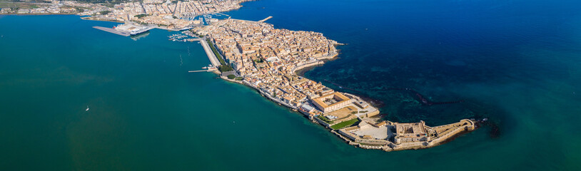Siracusa, Ortigia Island from the air, Sicily, Italy. Isola di Ortigia, coast of Ortigia island at...