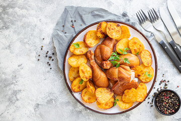 chicken and potatoes fried baked vegetable poultry meat dish on the table healthy meal snack copy space food background rustic 