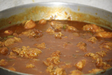 pot of meat with onion