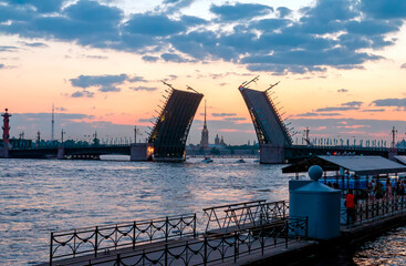 Fototapeta na wymiar View of over Neva River and Palace bridge at White Nights. White nights in the city of St. Petersburg. Russia.
