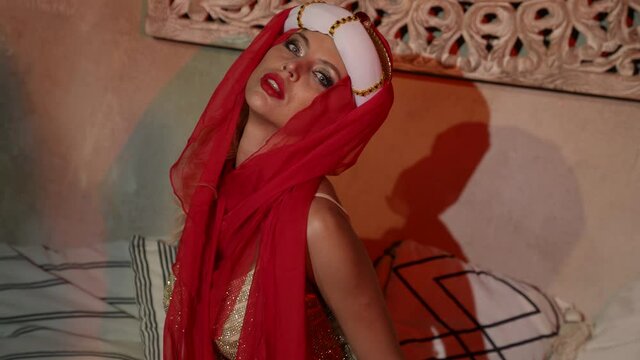 sexy concubine in harem, caucasian woman dressed in oriental clothes