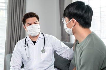 Man doctor in medical face mask holding document clipboard to discussion about result heath examination and encourage - obrazy, fototapety, plakaty