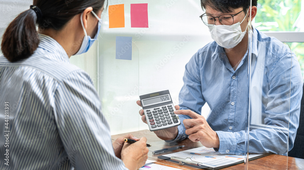 Poster asian business man showing investment amount on calculator to partner and discussion about new proje