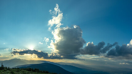 Beautiful panorama of sunset in the Carpathian mountains in summer