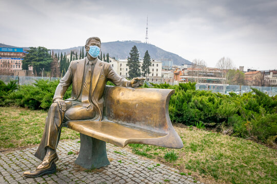 Ronald Reagan Statue In Rike Park With Medical Face Mask During Pandemic. Concept Of Corona Virus Pandemic And Social Life.Tbilisi.Georgia.25.03.2020