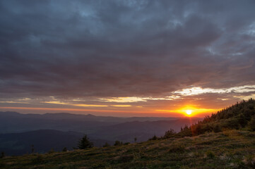 Naklejka na ściany i meble Beautiful sunrise in the Ukrainian carpathians. Morning landscape
