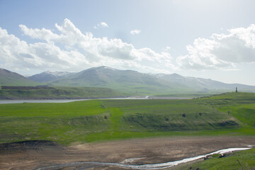 lake and mountains under the blue sky