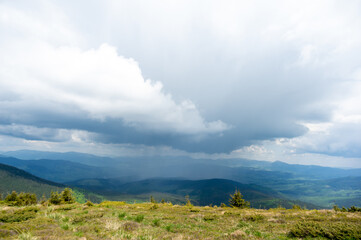 Naklejka na ściany i meble Rain and thunderstorm in the Carpathian mountains in Ukraine