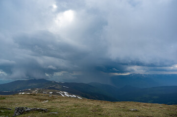 Obraz na płótnie Canvas Rain cloud and rain wall in the carpathian mountains