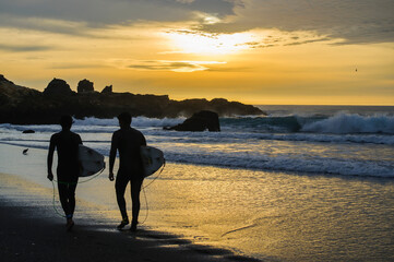 surfer cilhouette at sunset