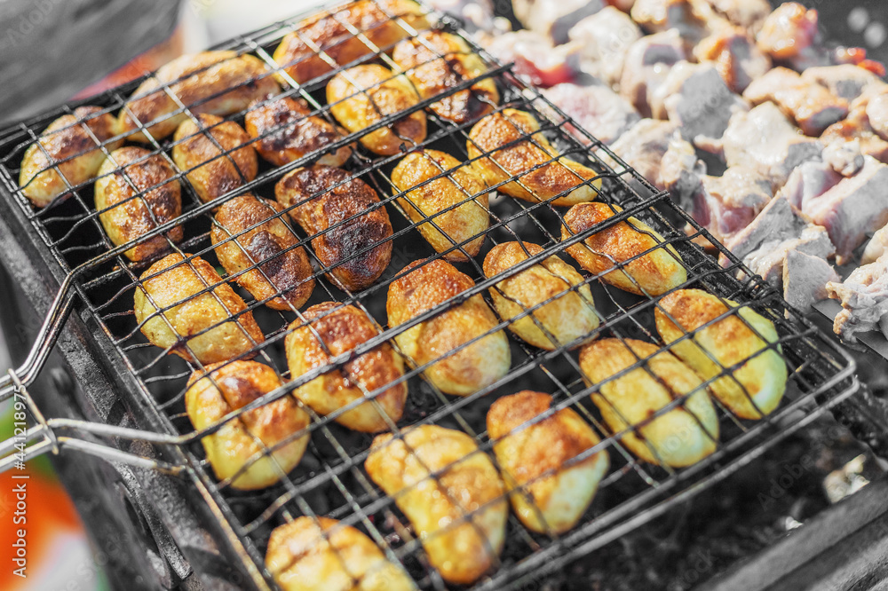 Wall mural pieces of potatoes with pork shashlik