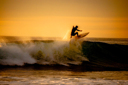 surfer cilhouette at sunset