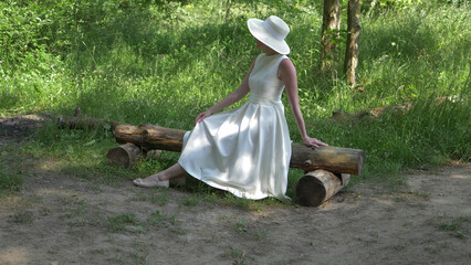 Girl is in field in summer