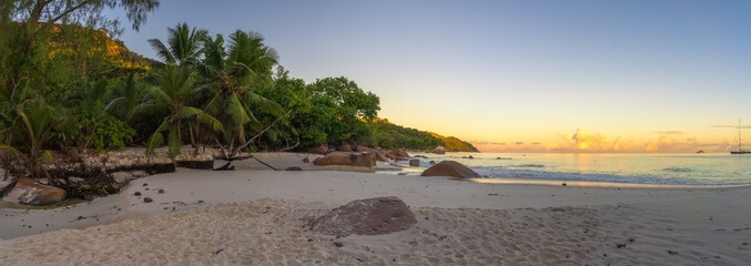 sunrise at tropical beach anse lazio on praslin on the seychelles - obrazy, fototapety, plakaty