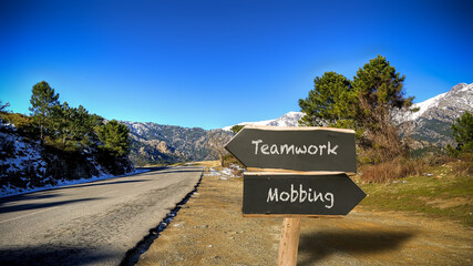 Street Sign to Teamwork versus Mobbing