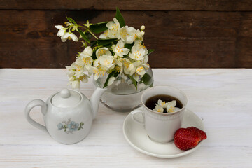 Jasmine, tea and strawberries.