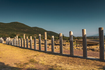Ruins in the Ancient Messene archeological site, Peloponnese, Greece. One of the best preserved ancient cities in Greece with visible remains dating back further than the 4th century BC.