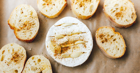 DIY baked cheese camembert instruction step by step. step 3 place the bread and camembert on a baking sheet with baking paper and add the spices. cheese with white mold.moldy cheese