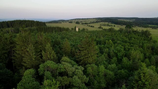 Aerial of the inner german border between GDR and FRG with watchtower, remnants of the cold war and the Berlin wall in 4k, Europe Germany Drone