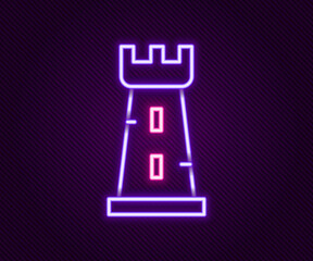 Glowing neon line Castle tower icon isolated on black background. Fortress sign. Colorful outline concept. Vector