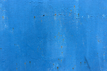 Old blue paint on vintage wall