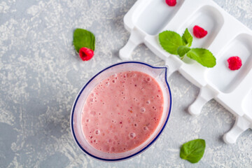 Step by step recipe. Cooking Homemade pink ice cream. Step4 mixed milk, bananas and raspberries in blender. Natural fruit and berry popsicle sugar free