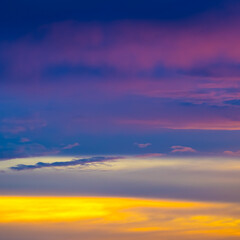 Milticolored clouds in the sky at sunset