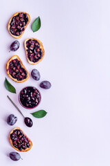 Toasted bread with plump jam. Food layout top view