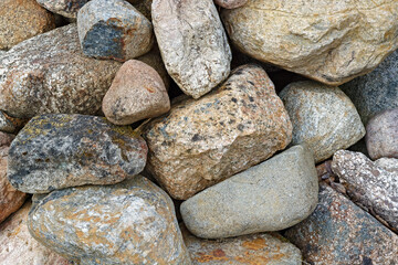 Fototapeta na wymiar Pile of large boulders, for use as abstract backgrounds and textures.