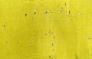 Yellow paint on wall. Abstract background