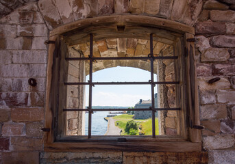 Old opening in the wall of the old Vaxholm fortress in the archipelago of Stockholm
