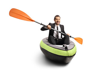 Businessman in a canoe with a paddle