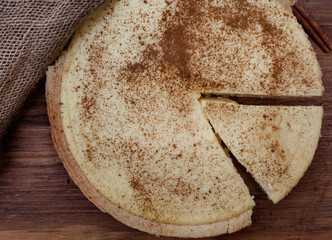 traditional South African milk tart on rustic farm style table