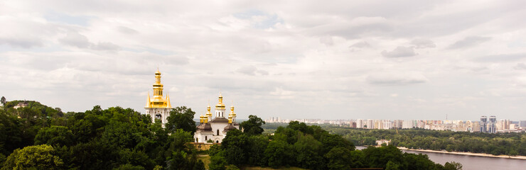 Fototapeta na wymiar Panorama of Kiev with Dniepr river, Kiev-Pechersk Lavra monastery. Kiev, Ukraine.