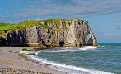 Famous cliffs of the Alabaster Coast at Etretat in Normandy, France - 441243331