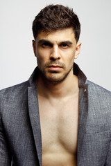 Portrait of an casual man, Stylish businessman, Portrait of the beautiful posing in a Studio, White background, Stylish man