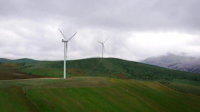Aerial drone view of wind turbine farm producing renewable energy Vestas is the energy industry